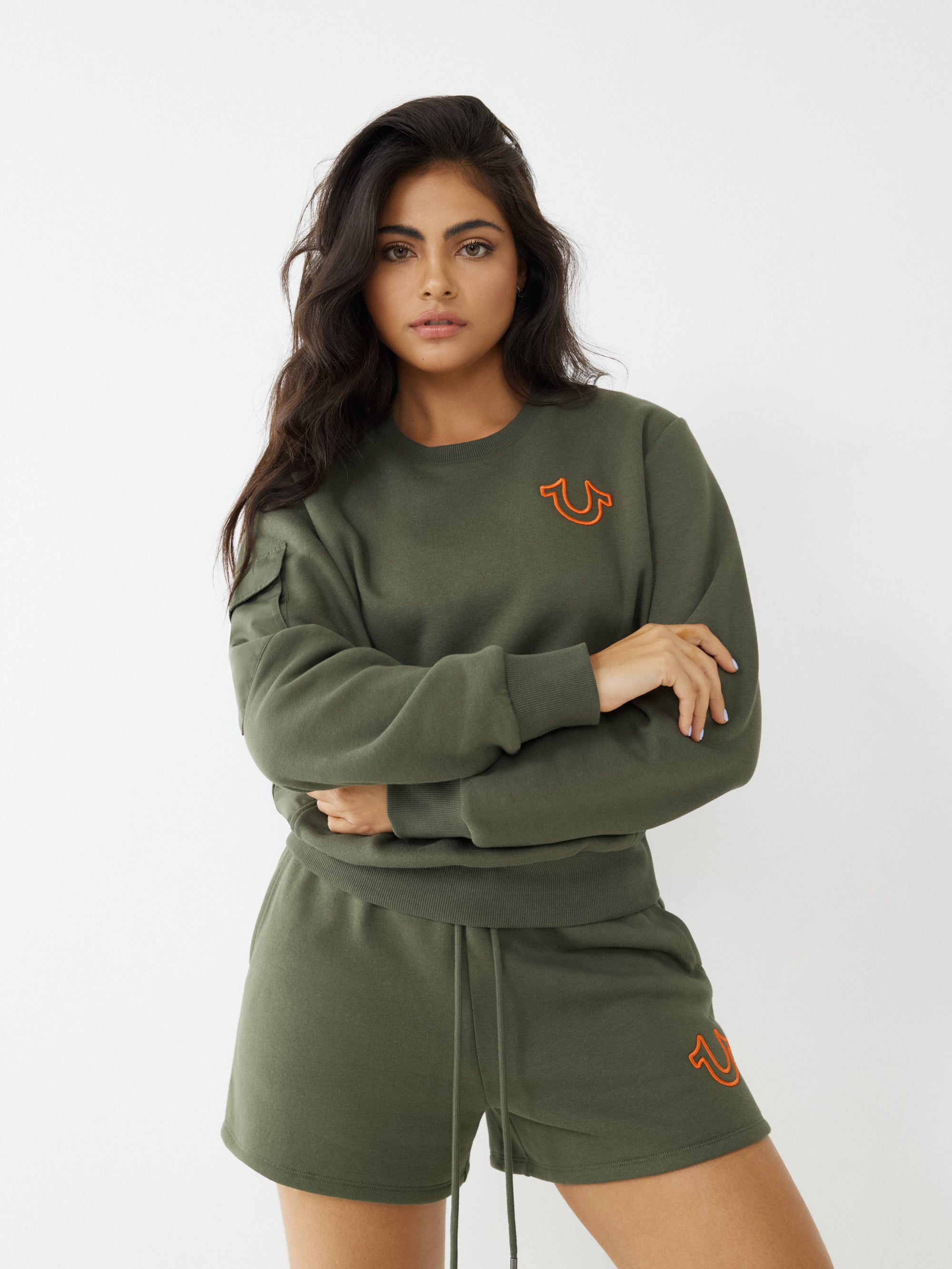 Women green regular fit sweatshirt