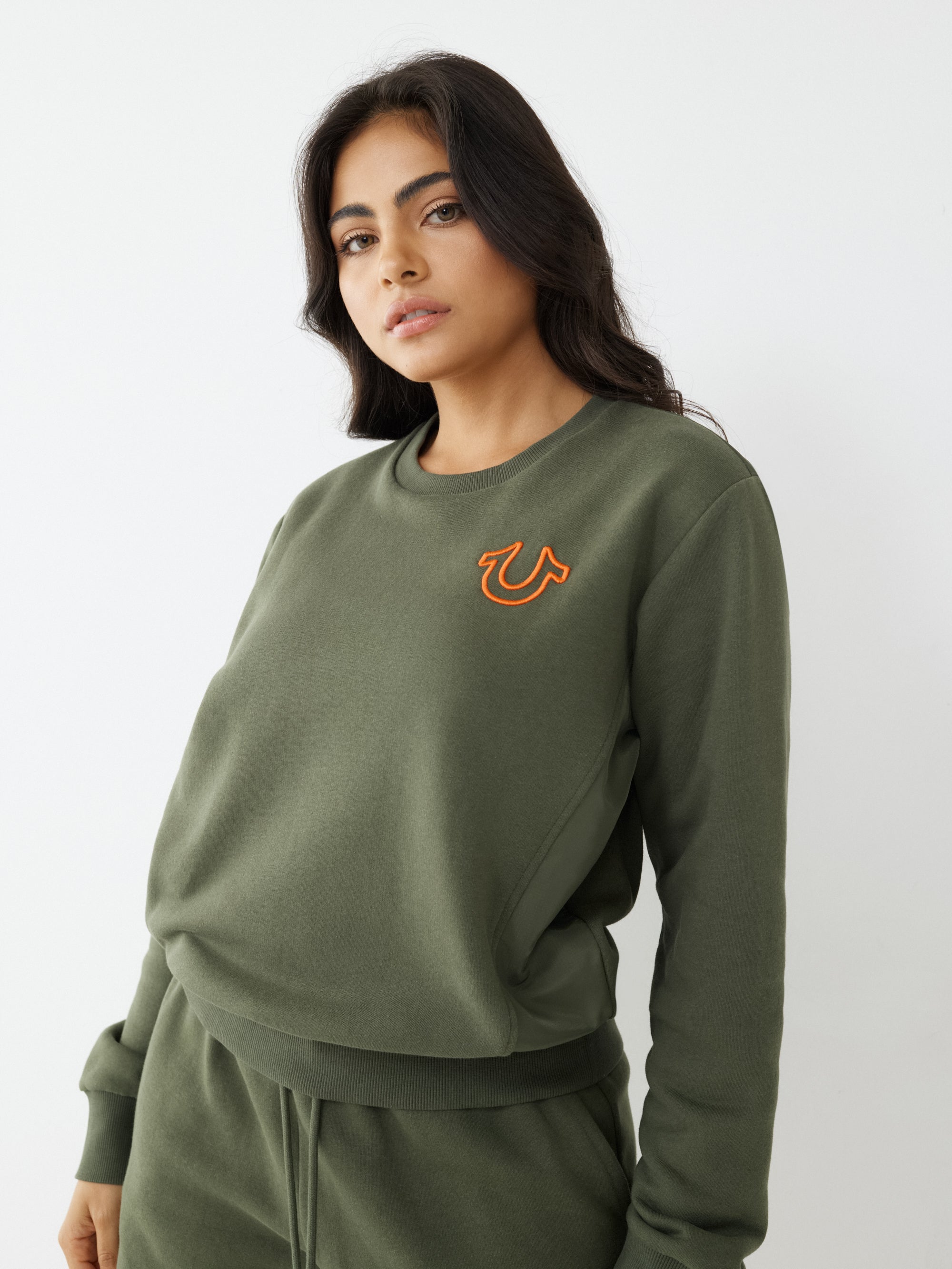 Women green regular fit sweatshirt
