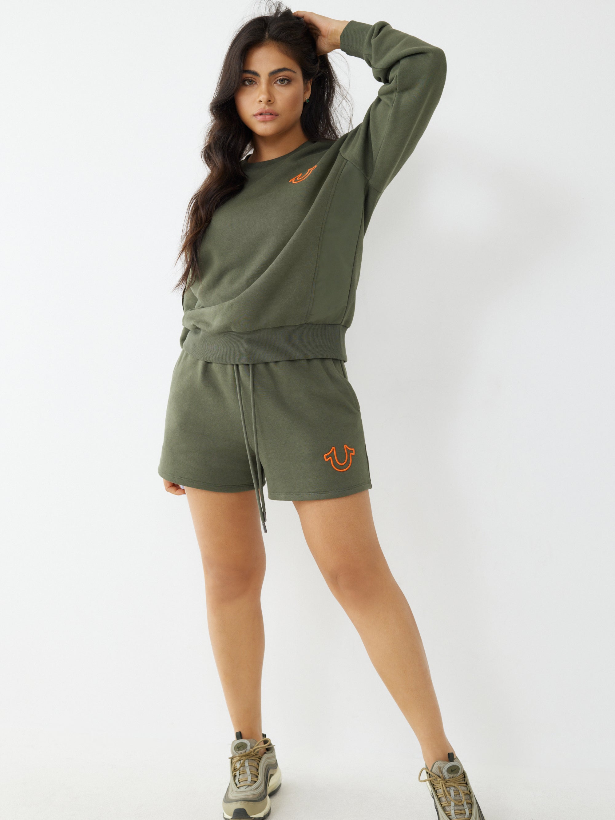 Women green regular fit sweatshirt
