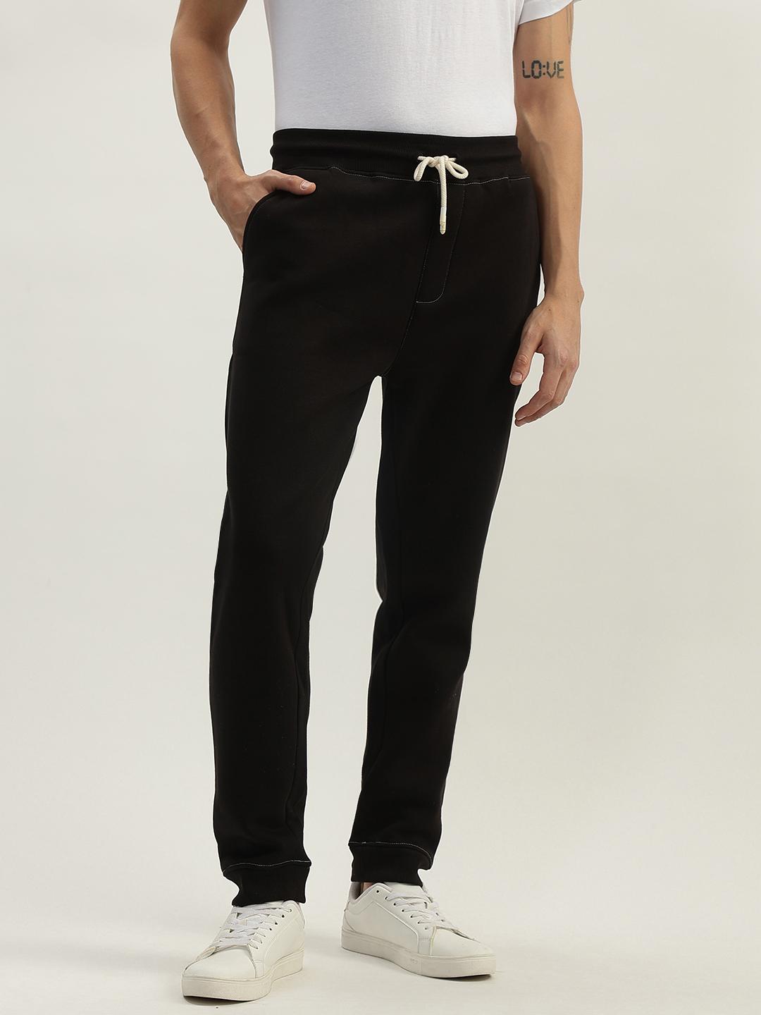 Men solid mid-rise sweatpant