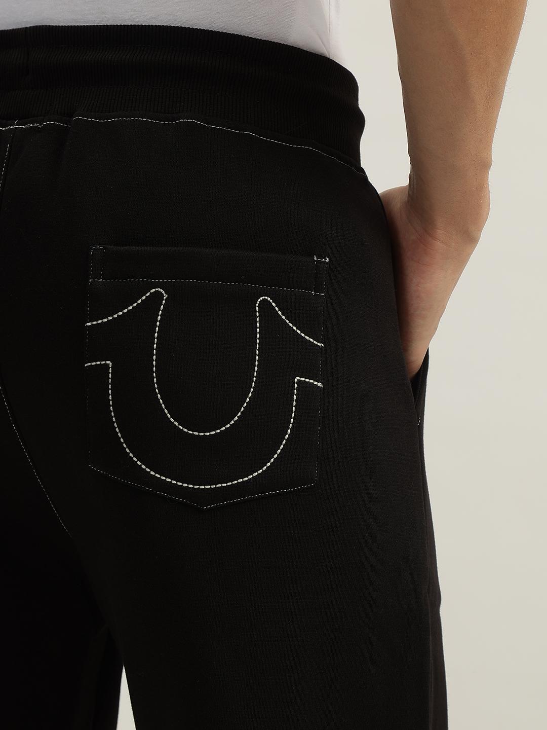 Men solid mid-rise sweatpant