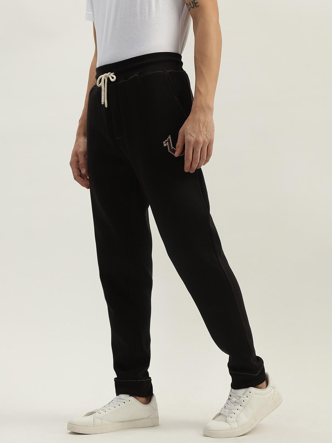 Men solid mid-rise sweatpant