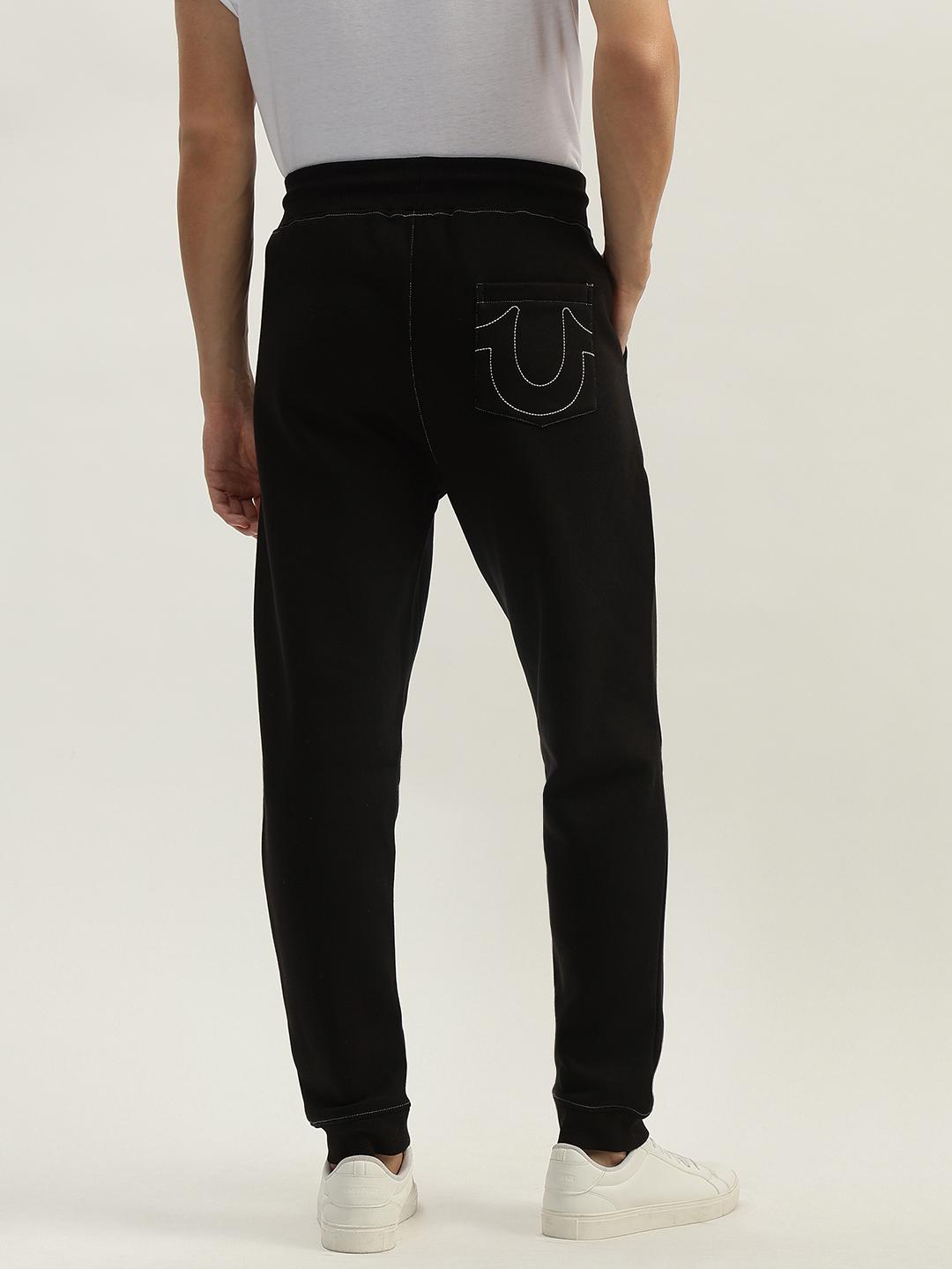 Men solid mid-rise sweatpant