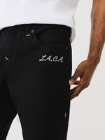 True Religion Sn Ricky Straight Fit Black Mid Rise Solid Jeans